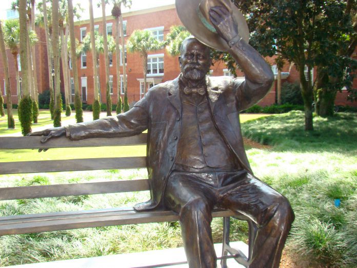 <p><p><strong>NAMESAKE’S GREETINGS —</strong> This statue of university namesake John B. Stetson seated on a bench greets visitors near the welcome center on the campus of Stetson University. The slightly-larger-than-life-size statue was installed recently behind Elizabeth Hall, seen in the background.</p></p><p>BEACON PHOTO/JOE CREWS</p>