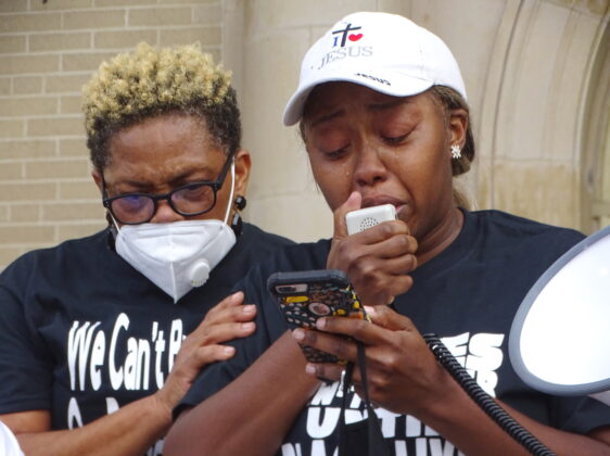 <p><p>Angela Dallas Johnson, left, and protest organizer Andrea McKinney, as McKinney reads from an emotional <a href="https://www.beacononlinenews.com/opinion/andrea-mckinney-late-is-better-than-never/article_4e54f89c-a671-11ea-a862-a3541b5bb937.html" target="_blank">statement</a>.</p></p><p></p>