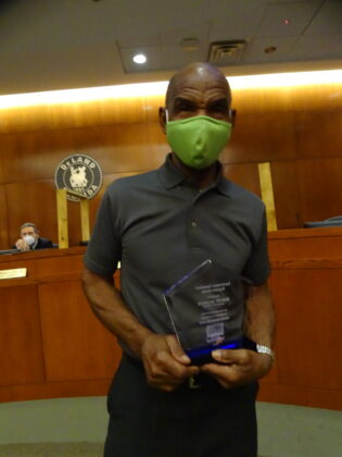 <p><p><strong>A TRUE NEIGHBOR —</strong> Robert Gillislee was recognized for his work pulling trash to the curb in his neighborhood for busy individuals and those unable to lug the trash toters.</p><p>“This community member truly has a servant heart and works to ensure that every member of his community is cared for and is treated like family. This man of few words definitely embodies what it means to love your community and the principle of service above self,” Shilretha Dixon said in presenting the award.</p></p><p>BEACON PHOTO/MARSHA MCLAUGHLIN</p>
