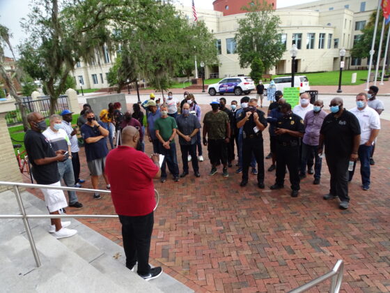 <p><p>On Saturday, June 20, local Andre Darby, in red, <a href="https://www.beacononlinenews.com/news/amidst-racial-reckoning-west-volusia-celebrates-juneteenth/article_97e96e68-b173-11ea-959b-cfbf53ac926c.html"
                    target="_blank">organized a morning stand against injustice</a>.</p>
                </p><p></p>