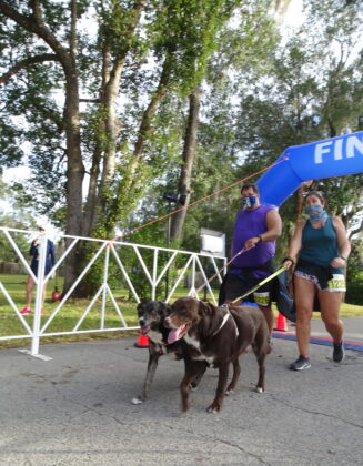 <p><p><strong>... AND THE DOGS! </strong>— The dogs lead the pack as Robert Skinner and Danielle Pandeline complete the race.</p></p><p>BEACON PHOTO/MARSHA MCLAUGHLIN</p>